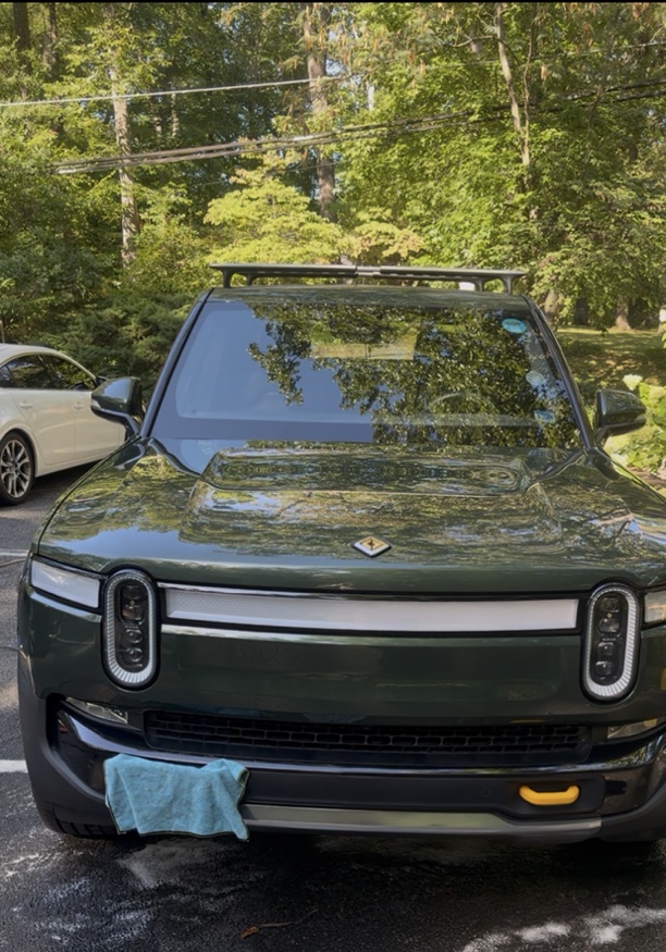Green Rivian R1T freshly washed